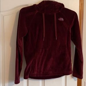 Woman’s north face sweatshirt